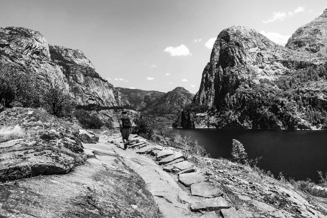 Noah Jigsaw Puzzle Hiking on the shoreline of Hetch Hetchy reservoir in Yosemite National Park, Sierra Nevada mountains, California; the reservoir is one of the main sources of drinking water for the San Francisco bay in black white 2000 pieces