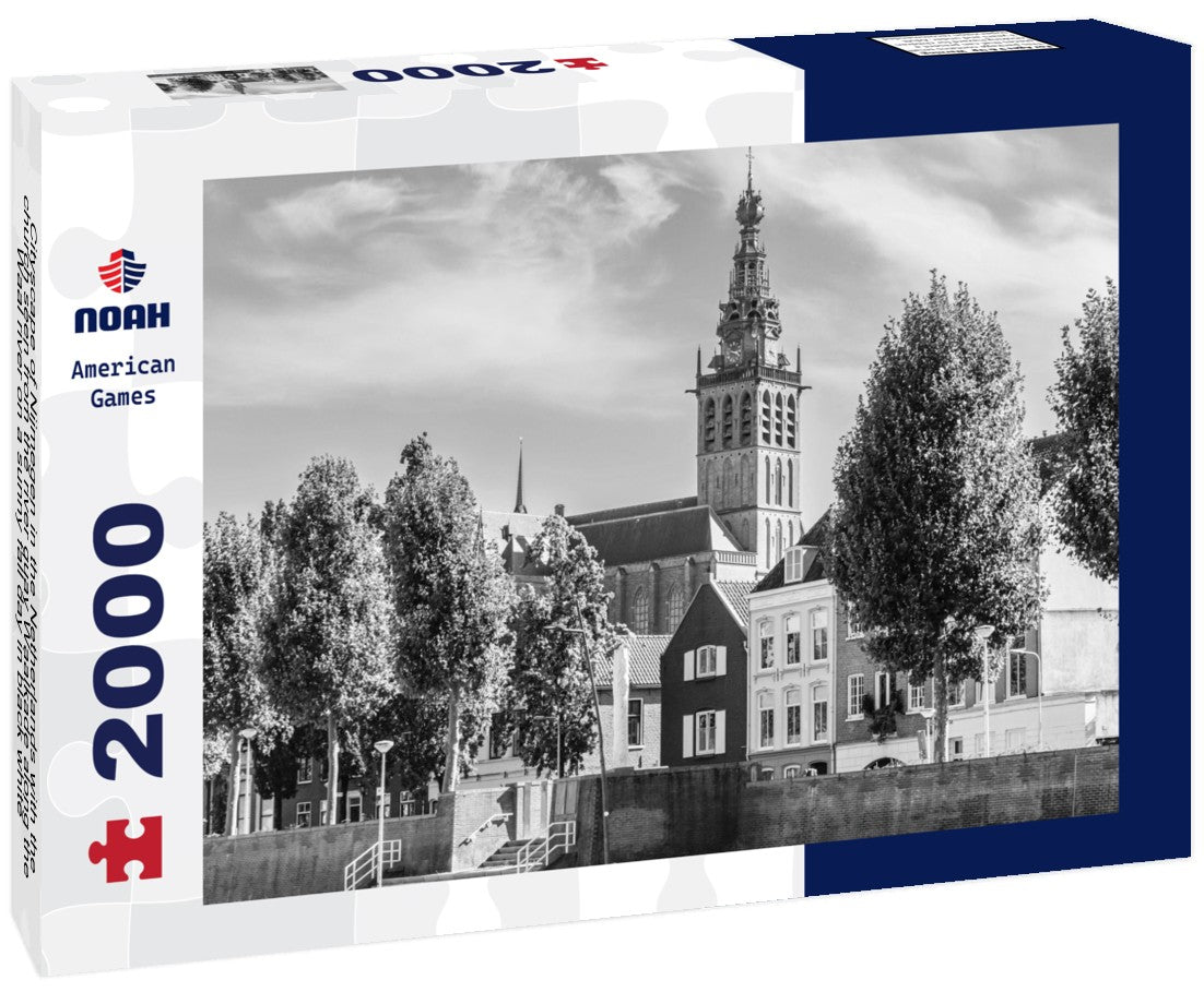 Noah Jigsaw Puzzle Cityscape of Nijmegen in the Netherlands with the church seen from the river quay Waalkade along the Waal river on a sunny fall day in black white 2000 pieces