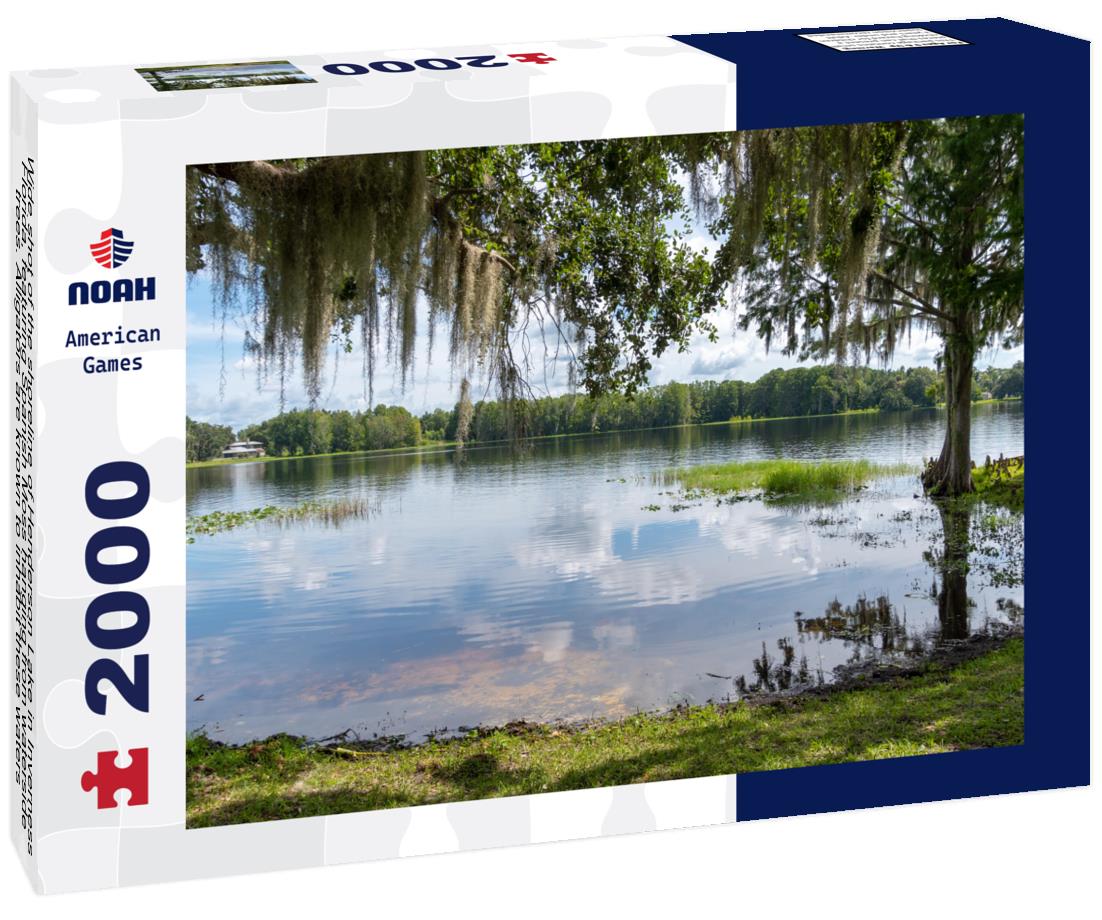 Noah Jigsaw Puzzle Wide shot of the shoreline of Henderson Lake in Inverness, Florida, featuring Spanish Moss hanging from waterside trees. Alligators are known to inhabit these waters 2000 pieces