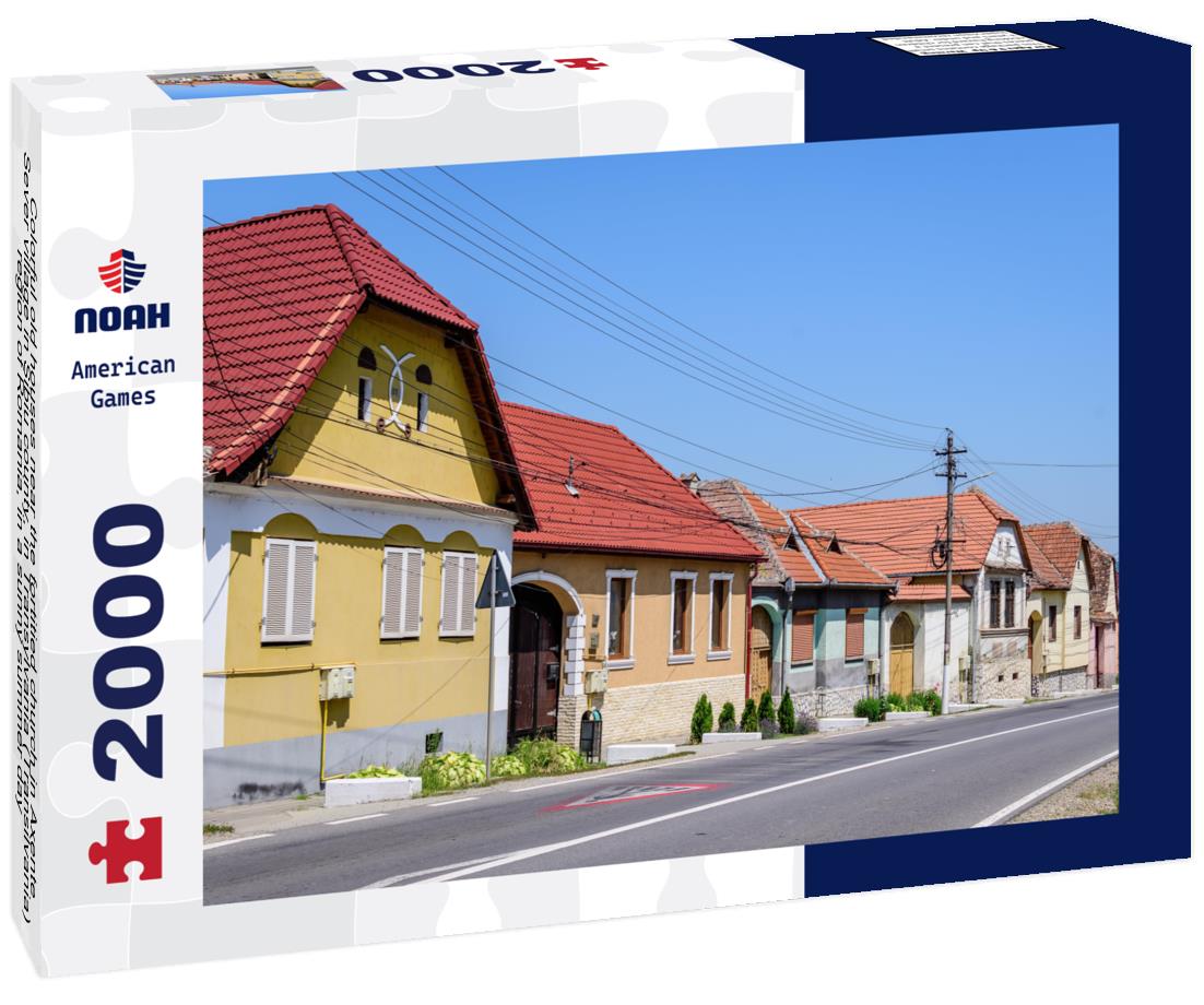 Noah Jigsaw Puzzle Colorful old houses near the fortitied church in Axente Sever village in Sibiu county, in Transylvania (Transilvania) region of Romania, in a sunny summer day 2000 pieces