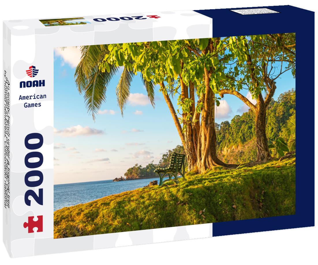 Noah Jigsaw Puzzle An empty bench under a tropical tree at sunset in front of the Pacific Ocean by humid rainforest, Corcovado national park, Osa Peninsula, Costa Rica 2000 pieces