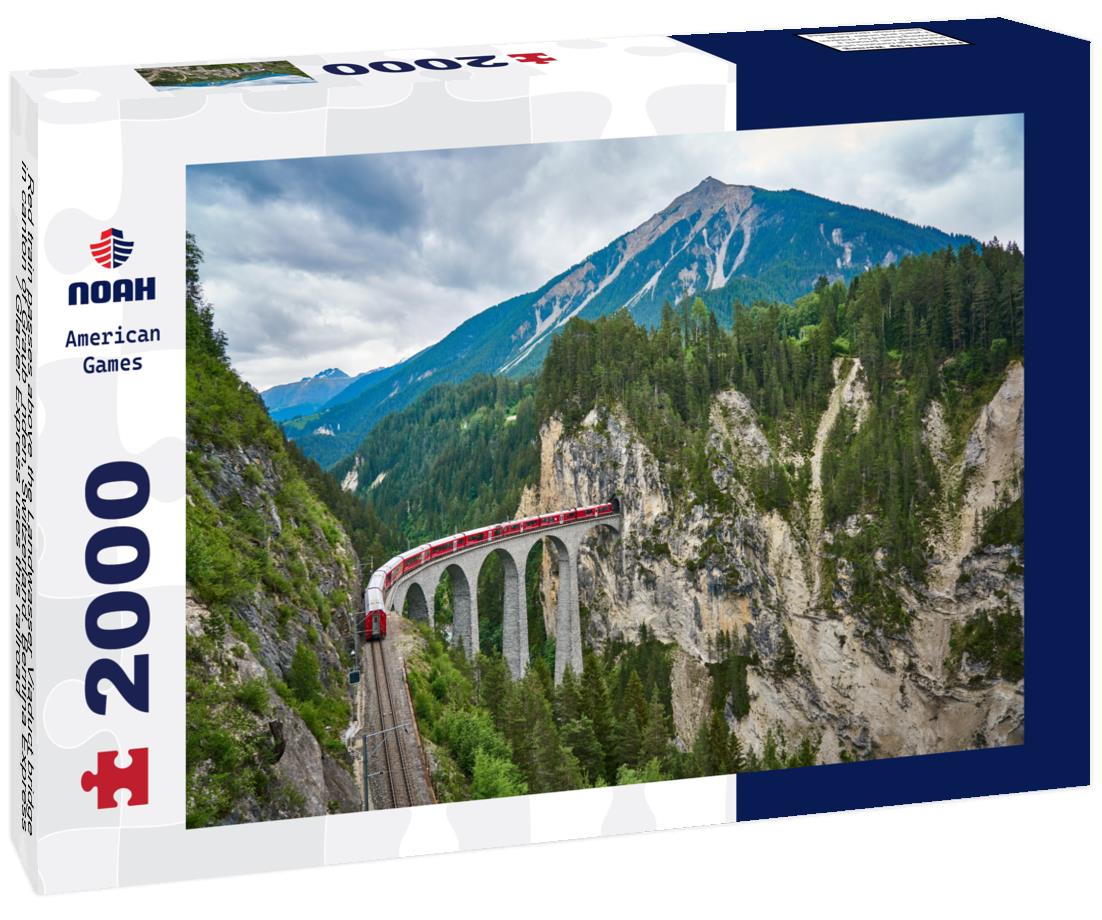 Noah Jigsaw Puzzle Red train passes above the Landwasser Viaduct bridge, in canton of Graubünden, Switzerland. Bernina Express / Glacier Express uses this railroad 2000 pieces