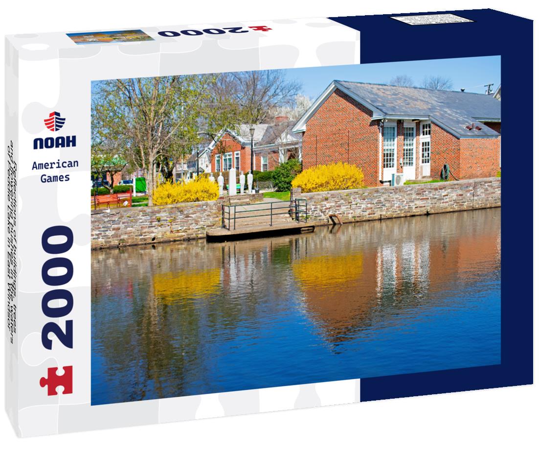 Noah Jigsaw Puzzle Reflections of buildings, trees, and flowering bushes in the waters of Peddie Lake in East Windsor, New Jersey, on a bright and sunny day -03 2000 pieces