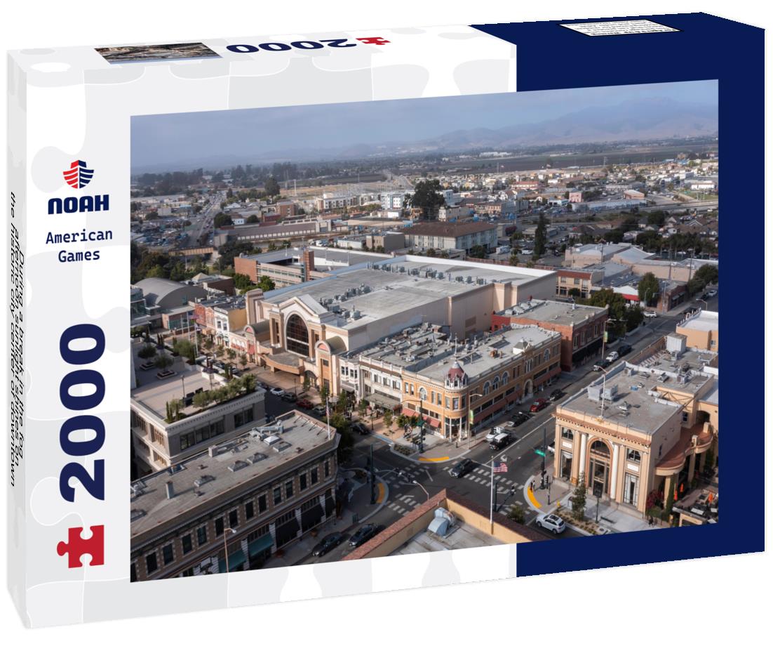 During a break in the fog, afternoon sunlight shines on the historic city center of downtown Salinas, California, USA 2000pc Puzzle