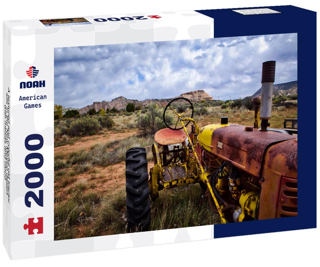 A textured and colorful old tractor sits in the New Mexico desert, with mesas and cloud-filled sky in the background 2000pc Puzzle