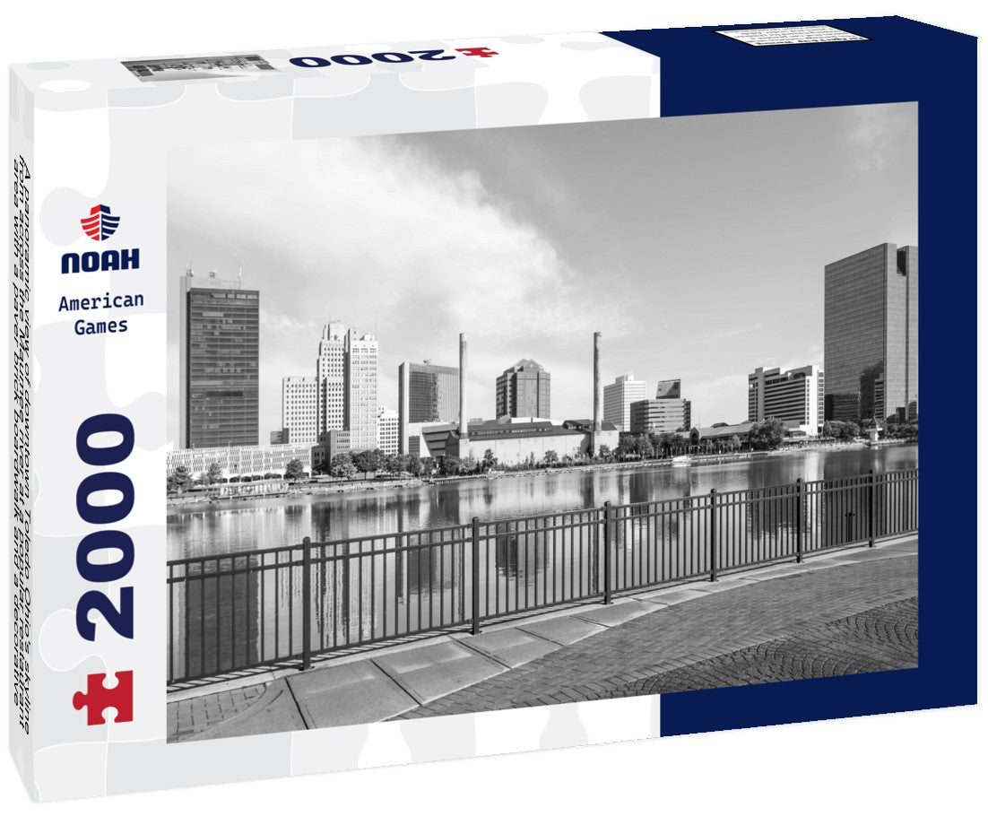 Noah Jigsaw Puzzle A panoramic view of downtown Toledo Ohio's skyline from across the Maumee river at a popular restaurant area with a paver brick boardwalk and a decorative iron railing in black white 2000 pieces