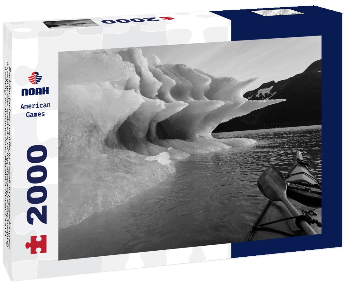 Noah Jigsaw Puzzle Paddler lashes paddle to kayak to pause journey to enjoy the splendor of the shapes of the melting Iceberg in summertime Alaska's Kenai Fiords National Park in black white 2000 pieces