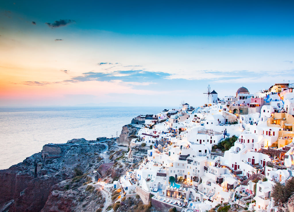 amazing view of Oia town at sunset in Santorini, Cyclades islands Greece