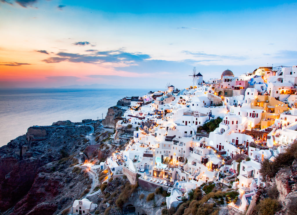amazing view of Oia town at sunset in Santorini, Cyclades islands Greece