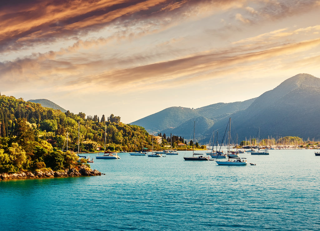 Wonderful sunny seascape with colorful sky during sunset. Ionian sea. Greece