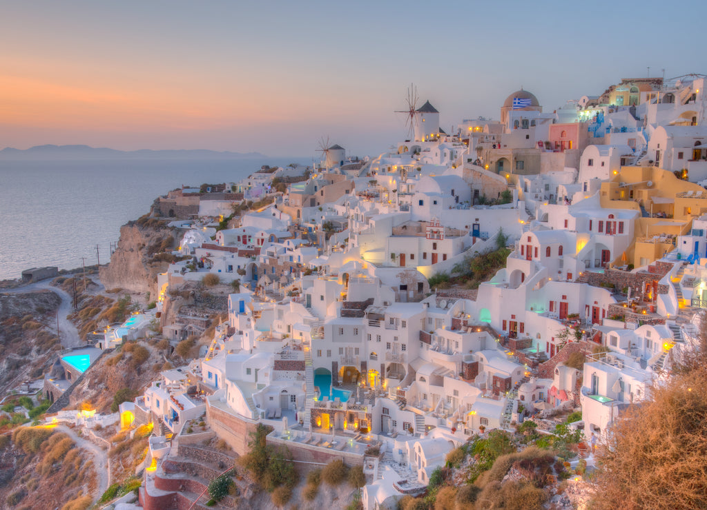 Sunset over Oia village In Santorini island, Greece