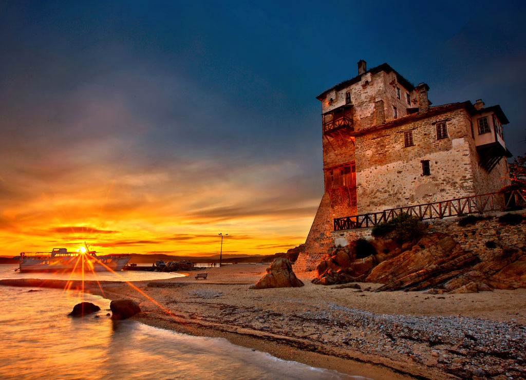 Sunset photo taken next to the Tower of Ouranoupolis ("Prosphorios Tower"), Halkidiki ("Chalkidiki"), Macedonia, Greece. Ouranoupolis is the gate to Mount Athos, known as "Agion Oros"