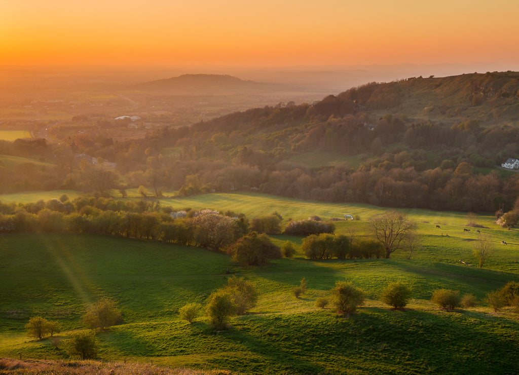 Scenic Warm Orange Sunset Sky over Gloucester Valley in England