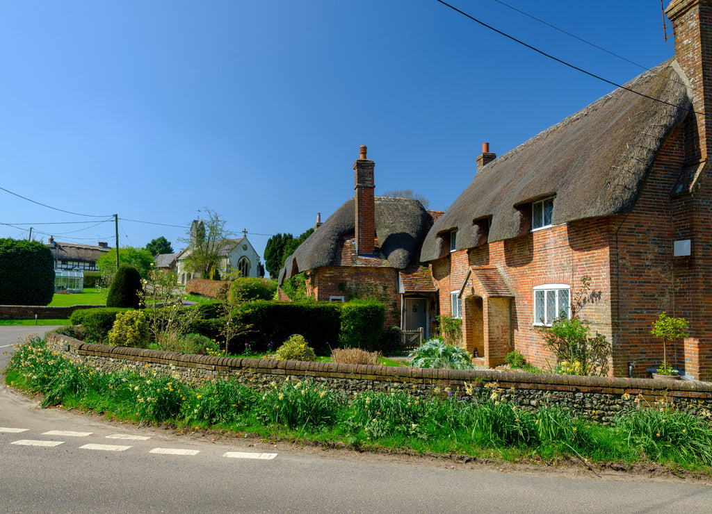 Afternoon spring sunshine in Beauworth Village, Hampshire, UK