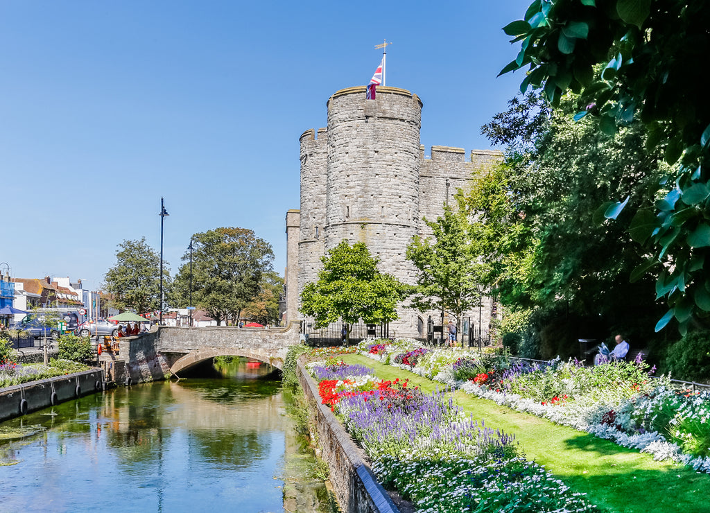 View on the Westgate towers from the wWetsgate gardens park in Canterbury on a sunny day, England, UK
