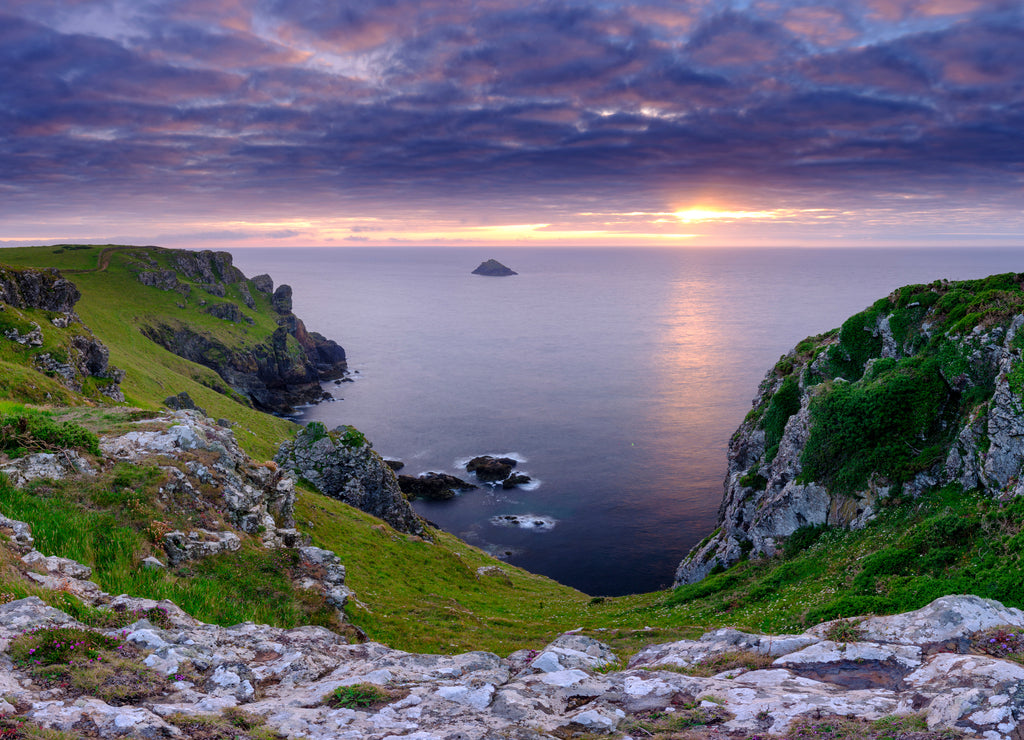 Summer sunset over The Rumps and Pentire Head on the North Coast of Cornwall, UK