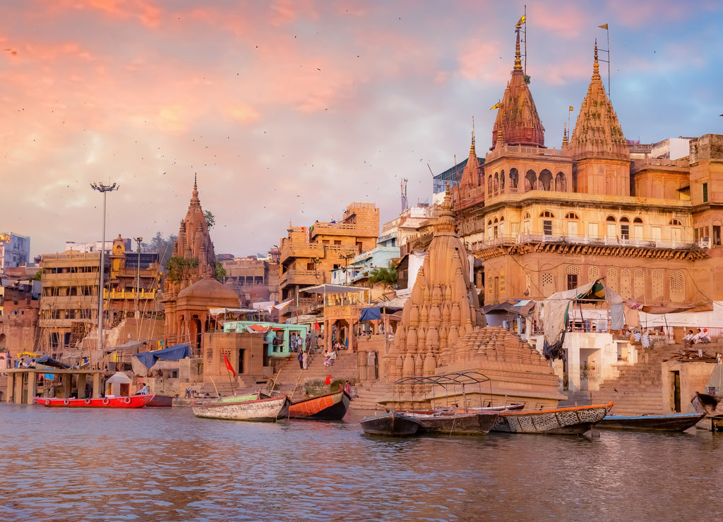 Varanasi ancient city architecture with Ganges riverbank at sunset