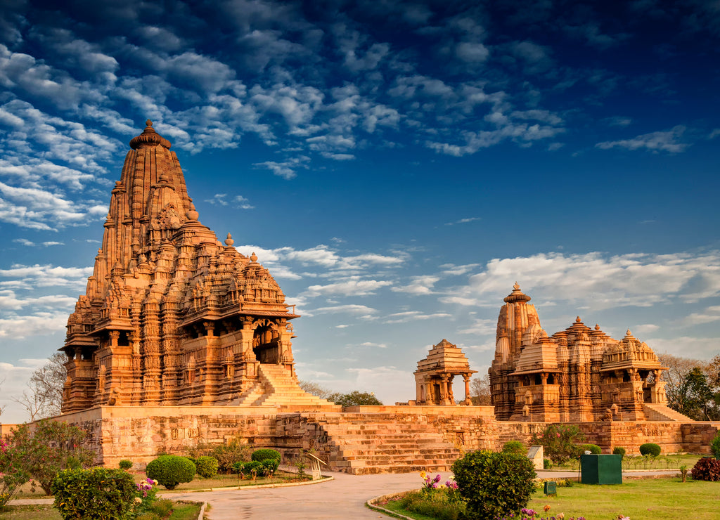 Beautiful image of Kandariya Mahadeva temple, Khajuraho, Madhyapradesh, India with blue sky and fluffy clouds in the background, It is worldwide famous , UNESCO world heritage site