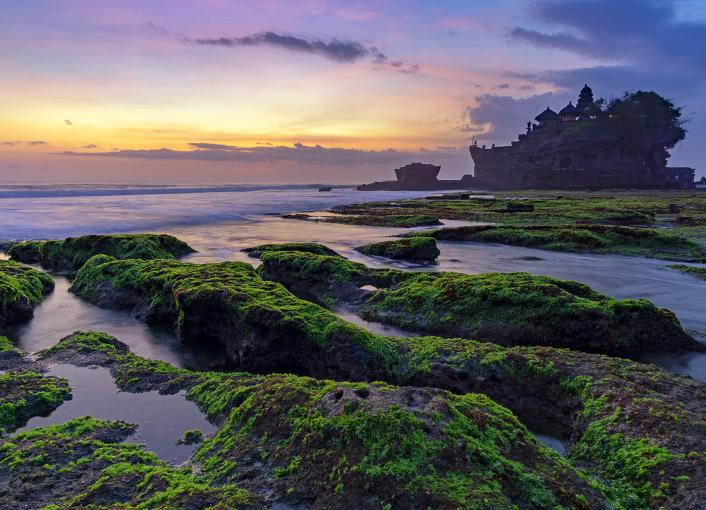 Sunset over Tanah Lot temple in Canggu, Bali, Indonesia