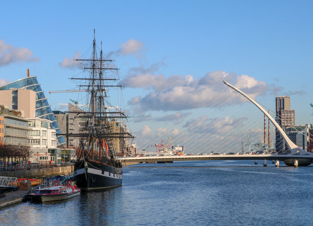 View of the river Liffey, Samuel Beckett Bridge and Jeanie Johnston Famine ship in Dublin. Ireland