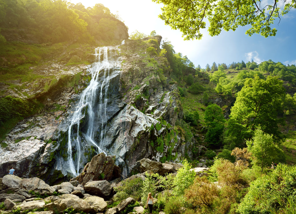 Majestic water cascade of Powerscourt Waterfall, the highest waterfall in Ireland. Tourist atractions in co. Wicklow, Ireland