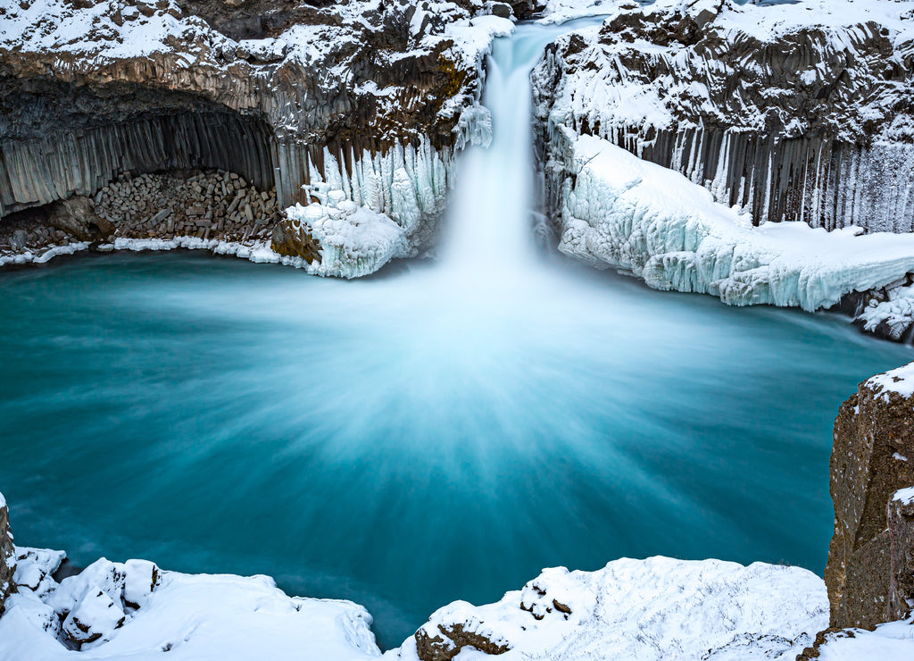 Soft, slow shutter creates blurry water at Aldeyjarfoss waterfall