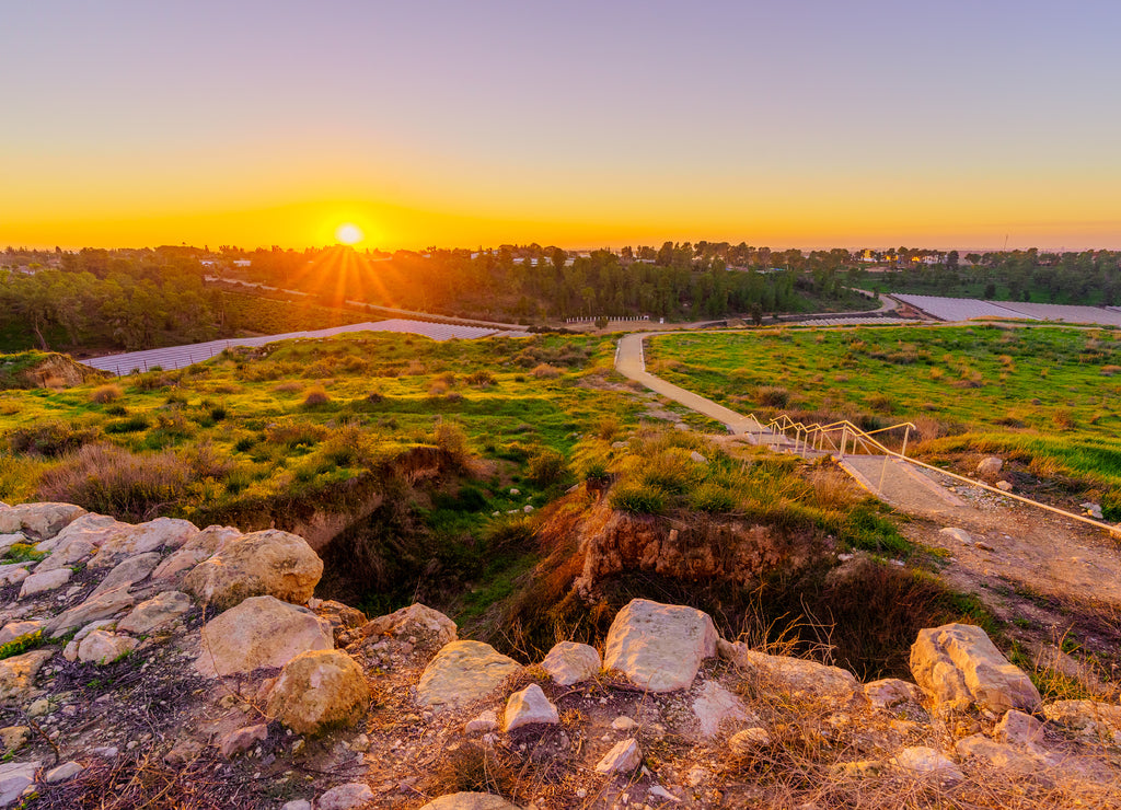 Sunset view of ancient ruins and countryside in Tel Lachish