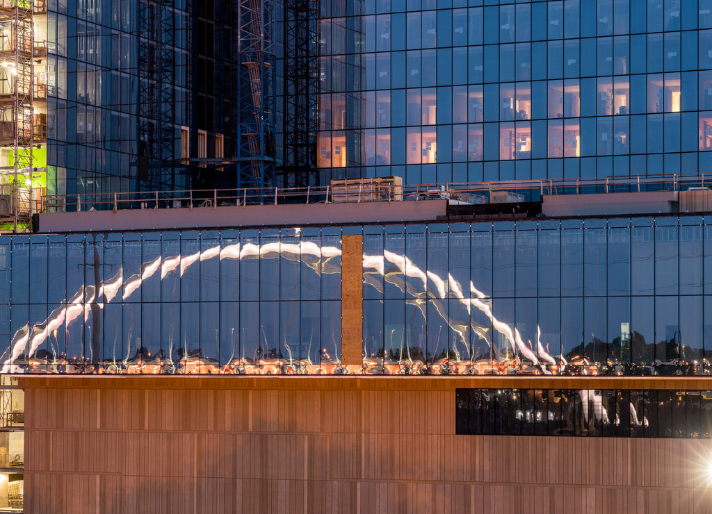 Reflection of the Korean veterans bridge illuminated in the evening in downtown Nashville Tennessee