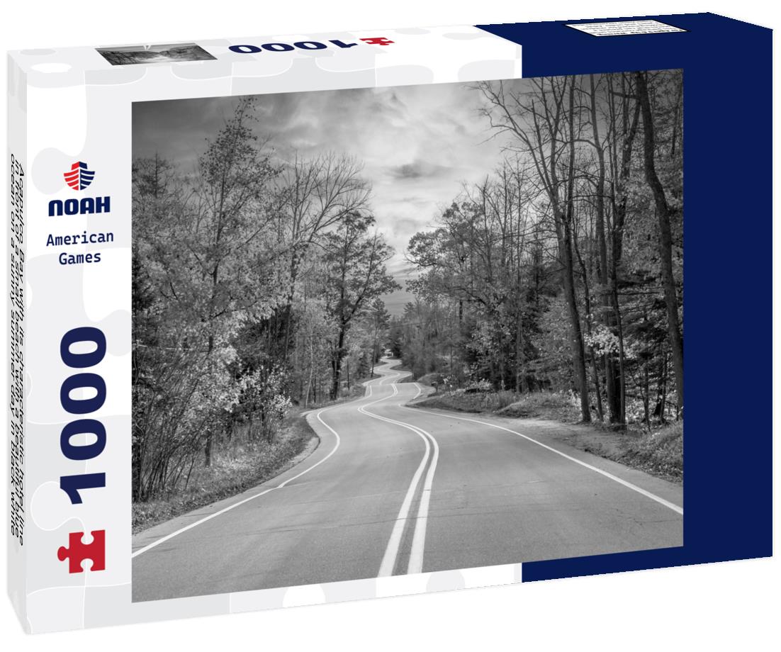 Noah Jigsaw Puzzle Acapulco Bay with its characteristic hotel line in front of a small beach with a beautiful blue ocean on a sunny summer day in black white 1000 pieces