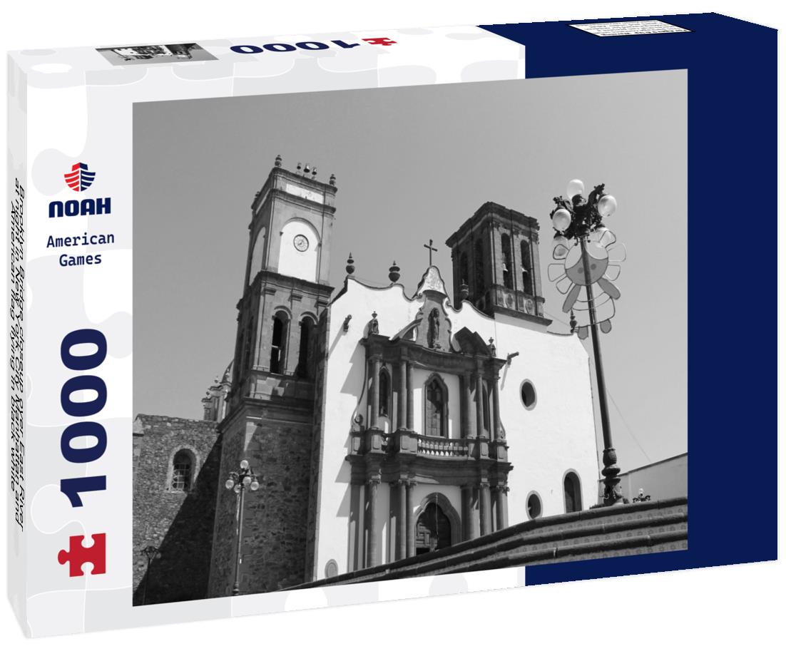 Noah Jigsaw Puzzle Brooklyn Bridge closeup over East River at night in New York City Manhattan and American flag flying in black white 1000 pieces