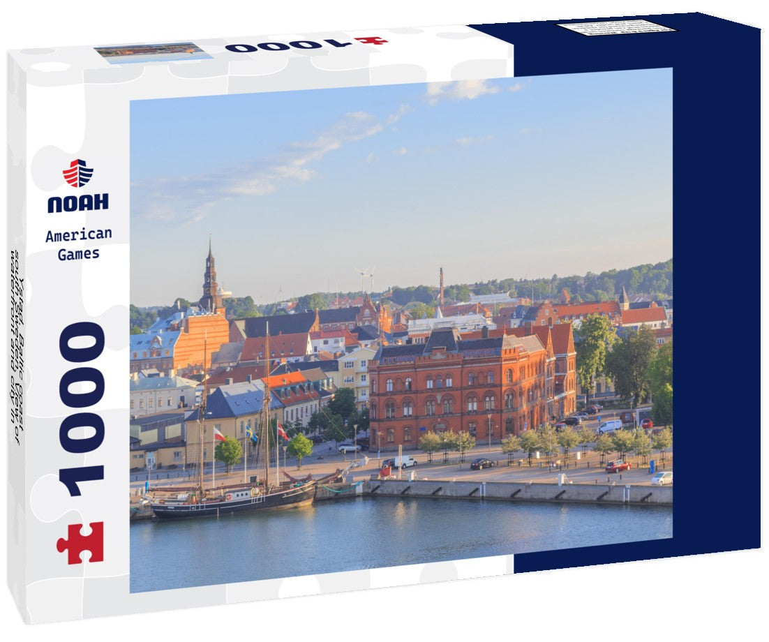 Noah Jigsaw Puzzle Ystad, Baltic coast, south Sweden. View of waterfront and city in rays of rising sun 1000 pieces