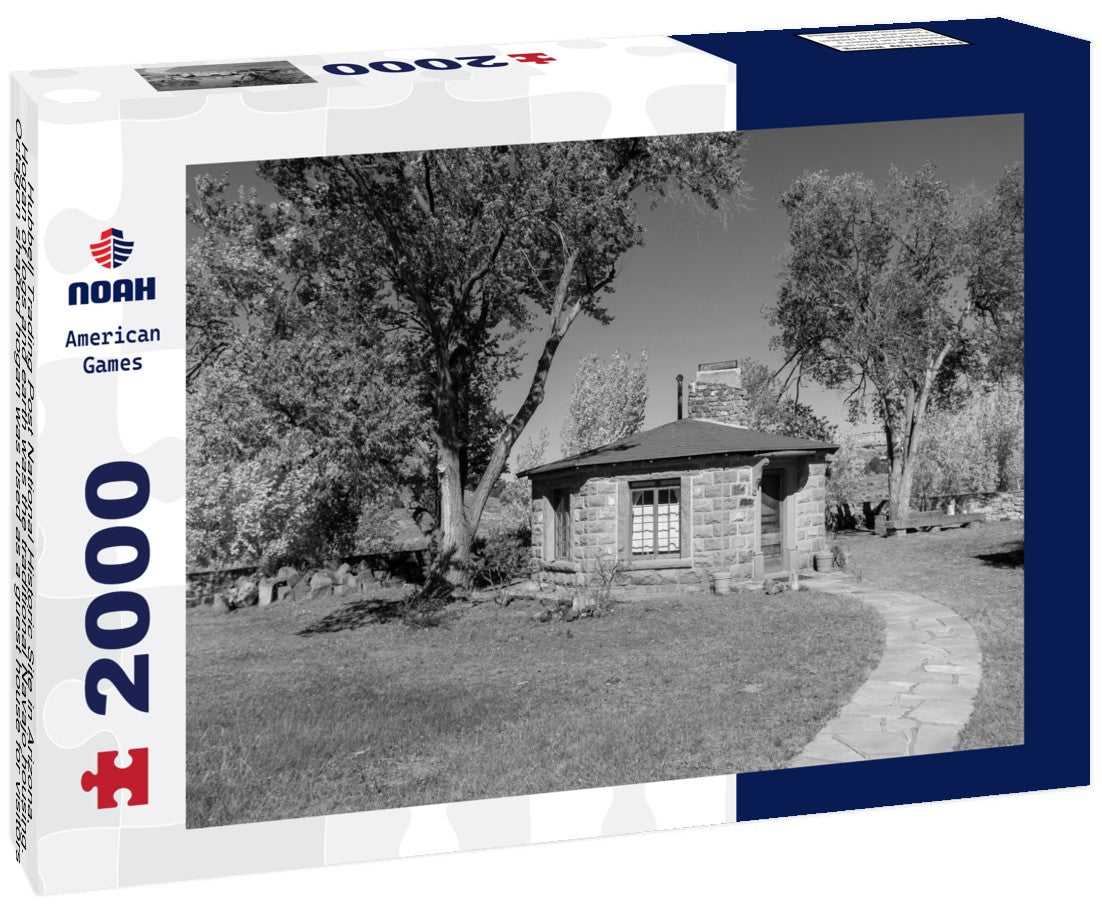 Hubbell Trading Post National Historic Site in Arizona. Hogan of logs and earth was the traditional Navajo housing. Octagon shaped hogan was used as a guest house for visitors, artist in residence 2000pc PuzzleBlack and White