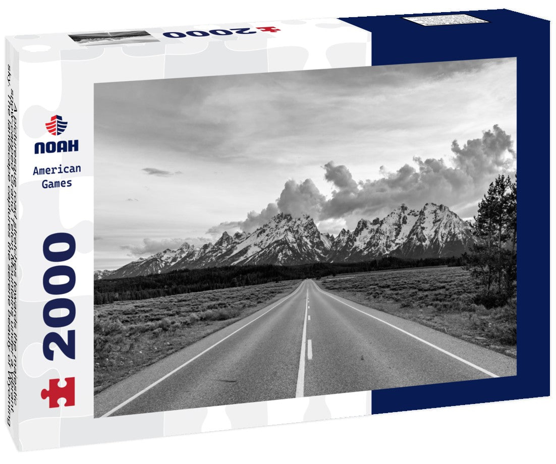 Noah Jigsaw Puzzle A picturesque road stretches towards the majestic, snow-capped Grand Teton Mountains under a vibrant sky. The landscape captures the serene beauty of Wyoming, evoking feelings of adventure in black white 2000 pieces