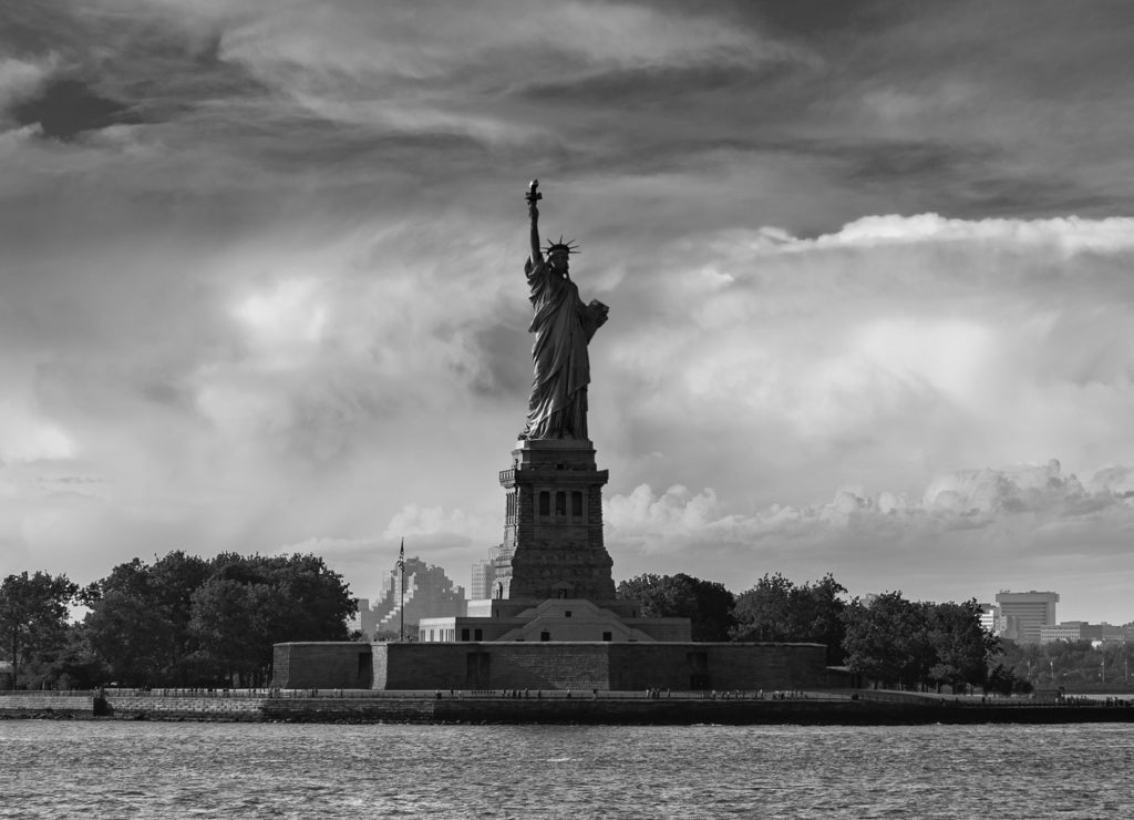 Statue of Liberty at sunset in black white