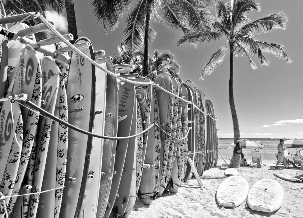 Surfboards in the rack at Waikiki Beach - Honolulu, Hawaii in black white