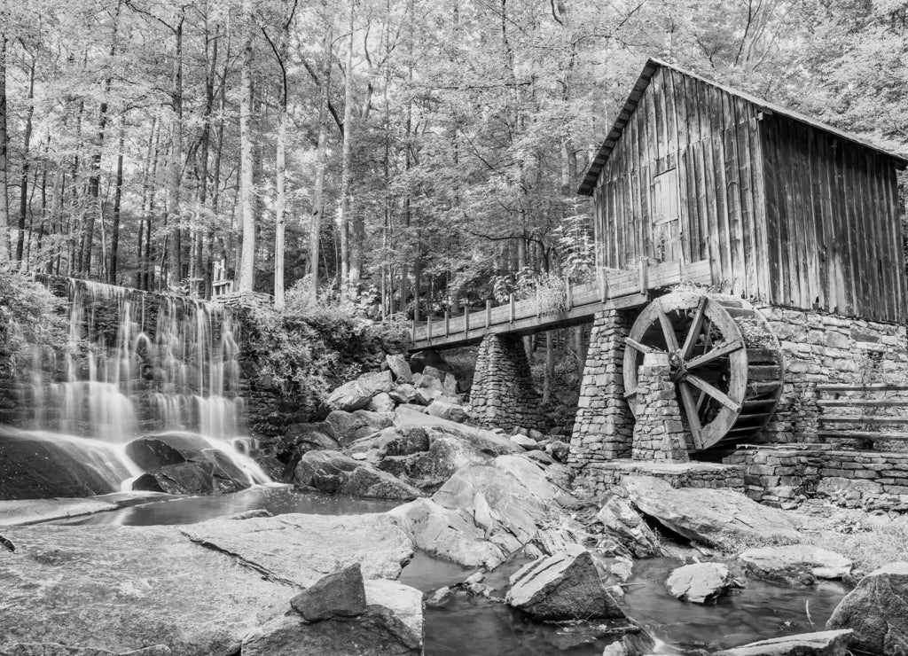 Fall or Autumn image of historic mill and waterfall in Marietta, Georgia in black white