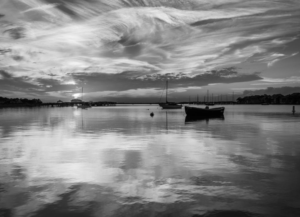 Sunset over the Folly River, in Folly Beach, South Carolina in black white