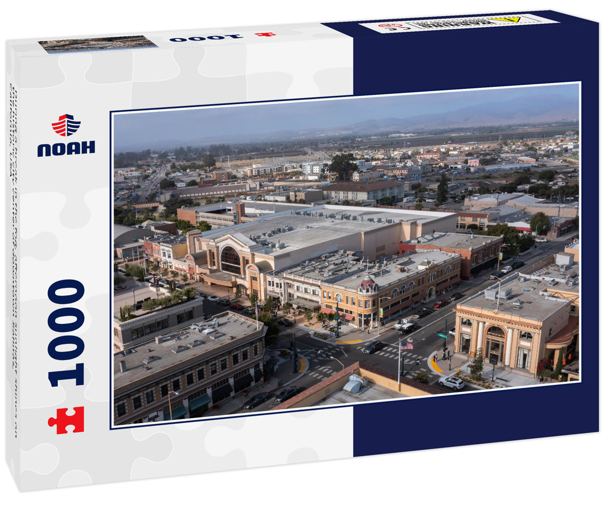 During a break in the fog, afternoon sunlight shines on the historic city center of downtown Salinas, California, USA