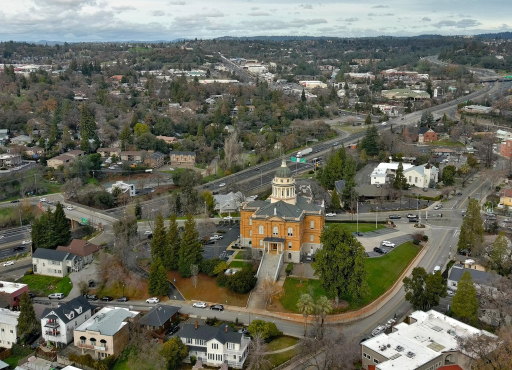 Downtown Old Auburn California with view of the Sierra Nevada Mountains. The Old Courthouse was recently renovated and is still a functioning government building