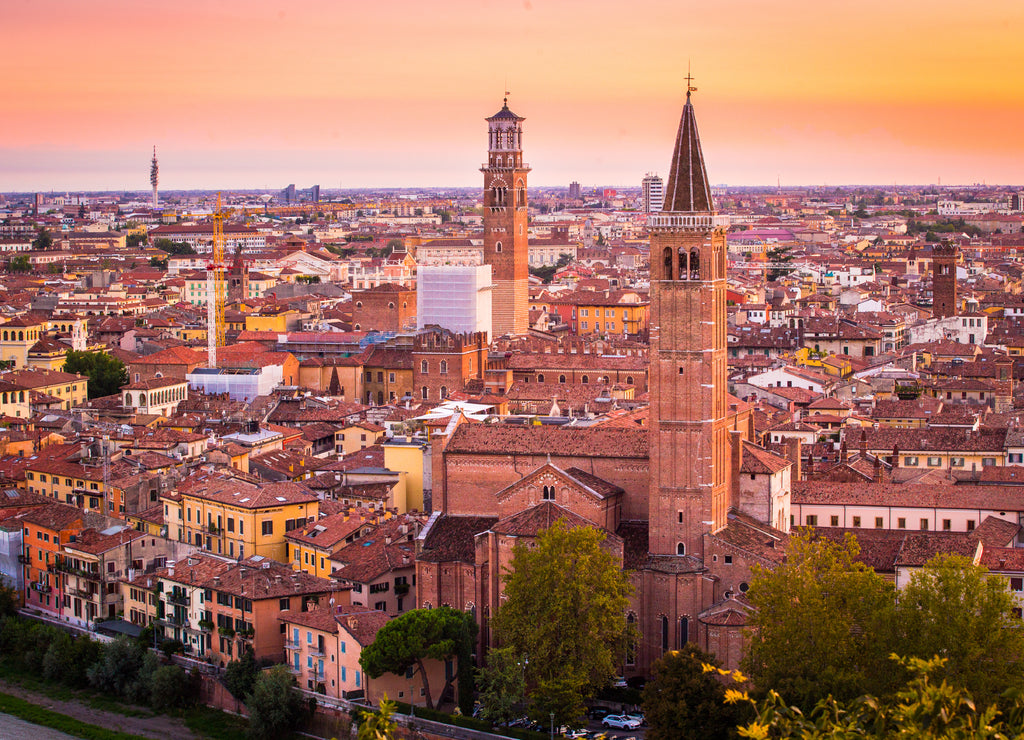 Verona city night cityscape and Church Santa Anastasia, with Adige river , located in Veneto