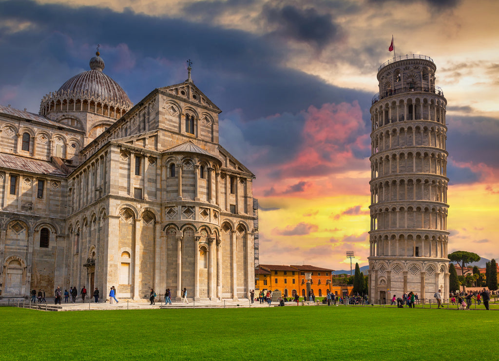 Cathedral and the Leaning Tower of Pisa at sunset, Italy biggest landmark