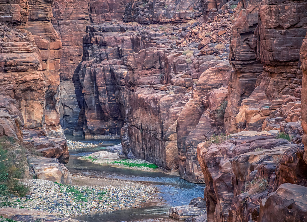 incredibly impressive and beautiful canyon with rocky cliffs in the national park of Jordan Wadi Mujib