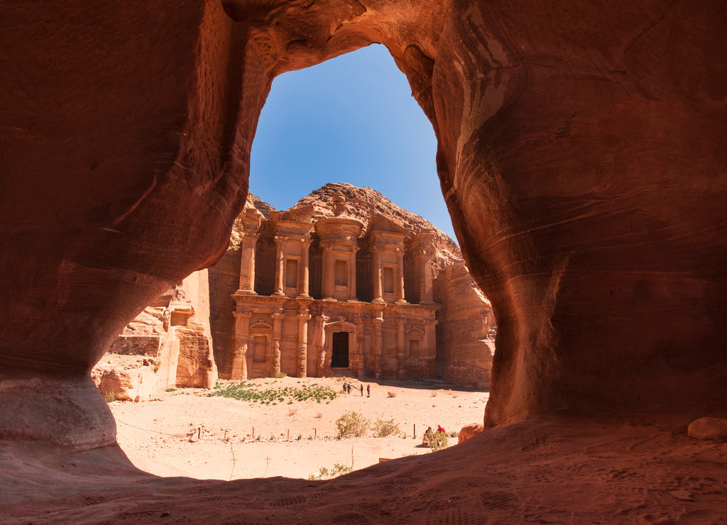 cave and monastery ad - dier in the desert mountains of Jordan in the ancient city of Petra