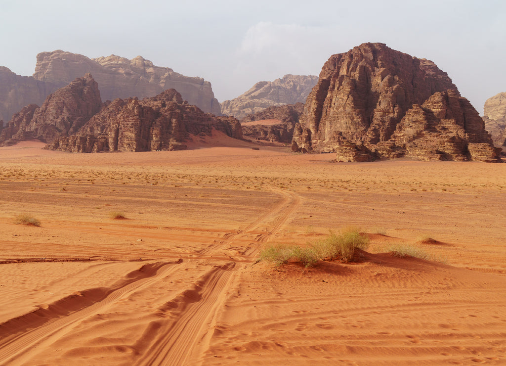 Wadi Rum desert, Jordan. The Valley of the Moon. Red sand, mountains and haze