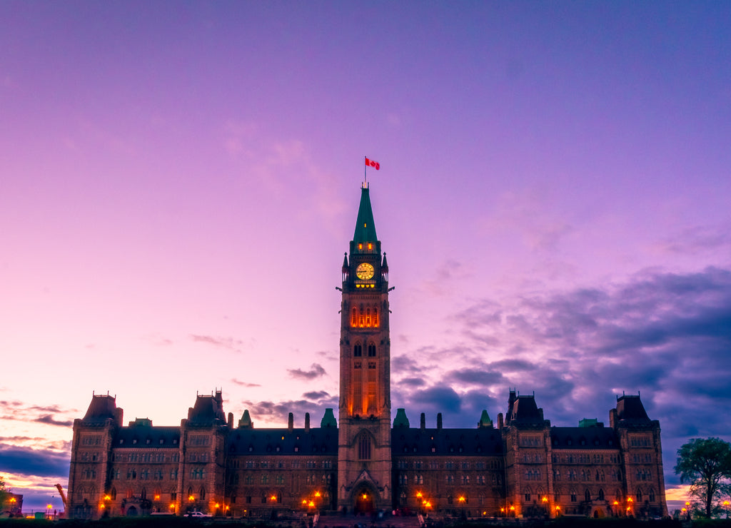 Canada parliament building and centennial flame fountain in Ottawa during blue hour