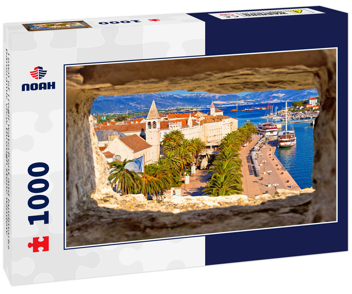 Town of Trogir waterfront and landmarks panoramic view through stone window