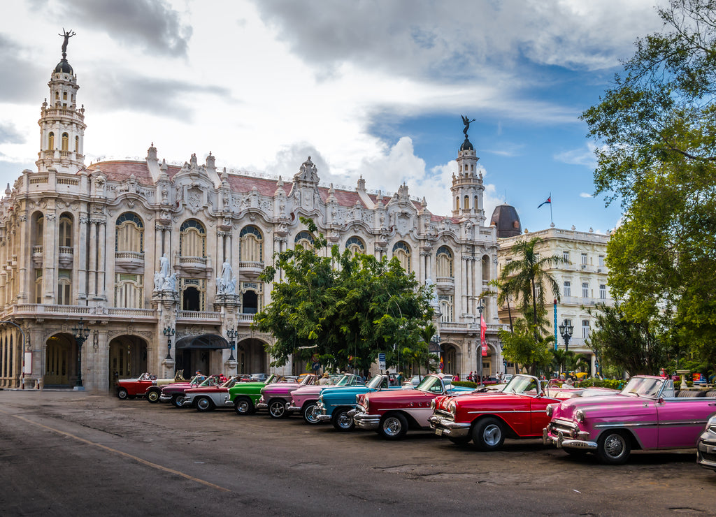 Cuban colorful vintage cars in front of the Gran Teatro - Havana, Cuba