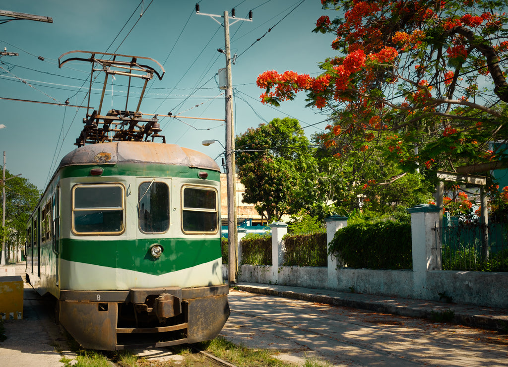 Vintage image of an old electric train in Cuba