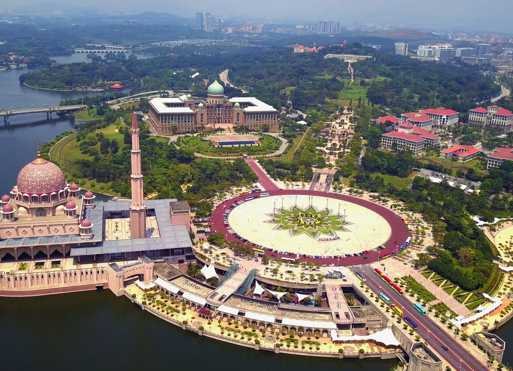 Aerial view of Putra mosque with garden landscape design and Putrajaya Lake, Putrajaya. The most famous tourist attraction in Kuala Lumpur City, Malaysia