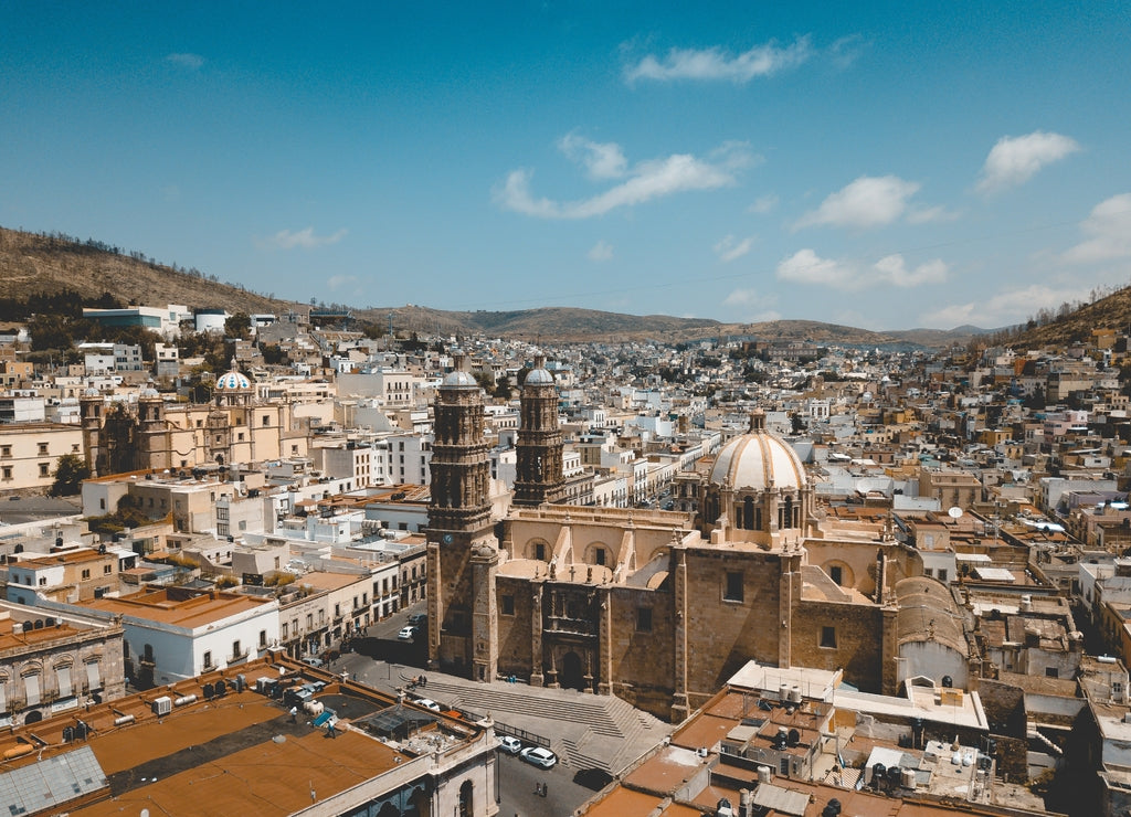 Aerial shot of the cathedral in Zacatecas Mexico under a blue sky at daytime